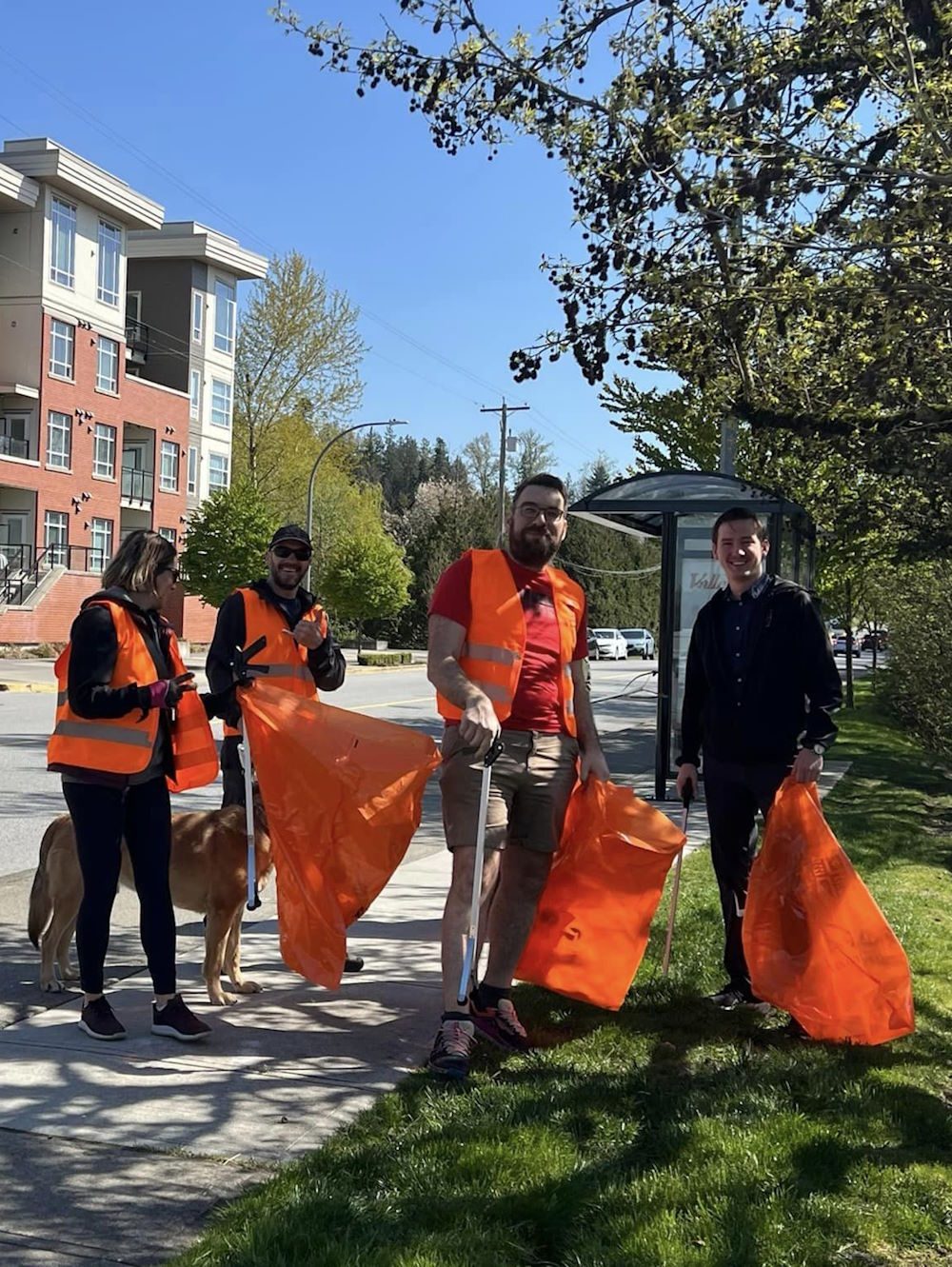 Clean-up volunteers with orange bags