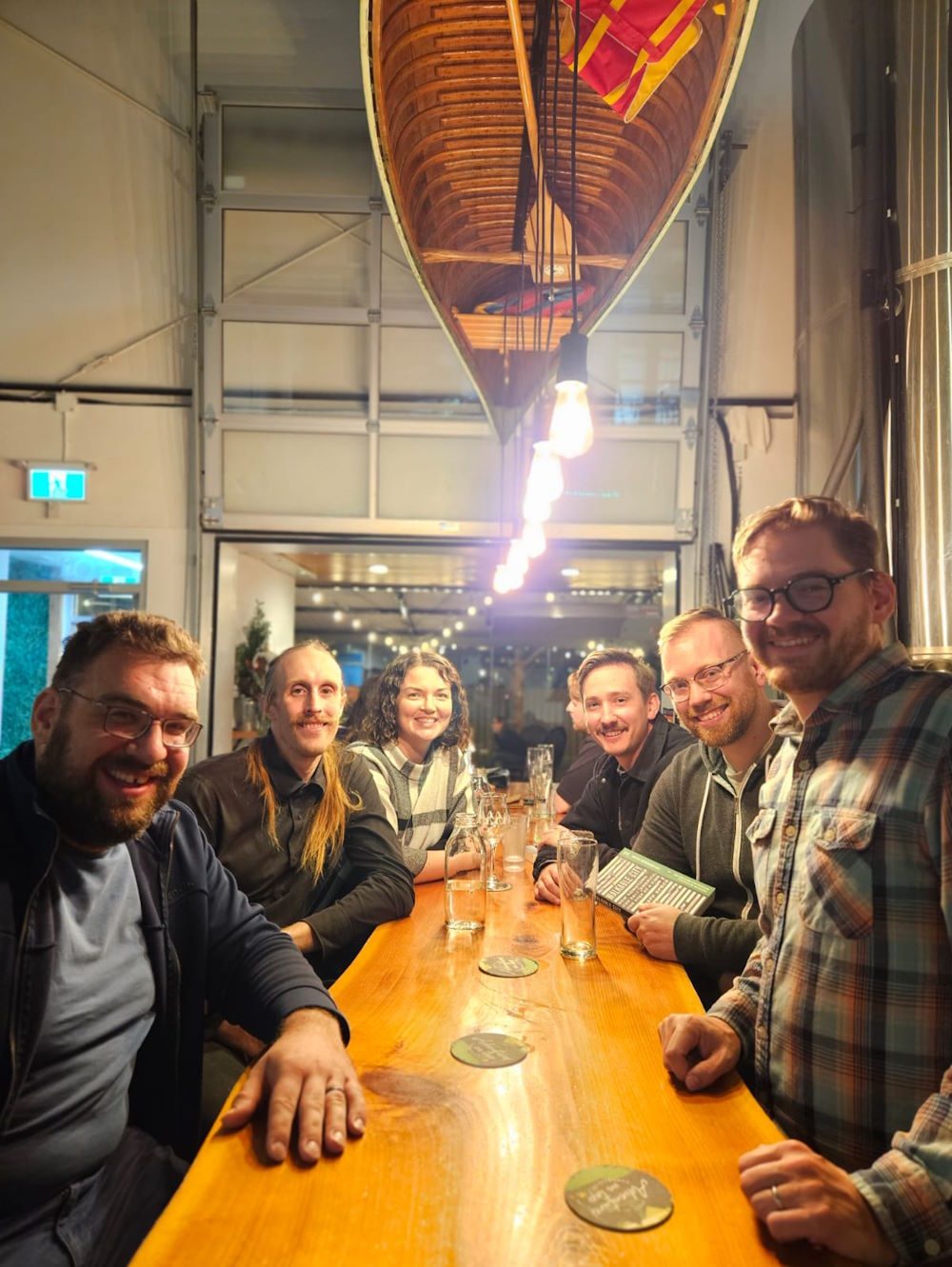 Friends around a table at a meetup