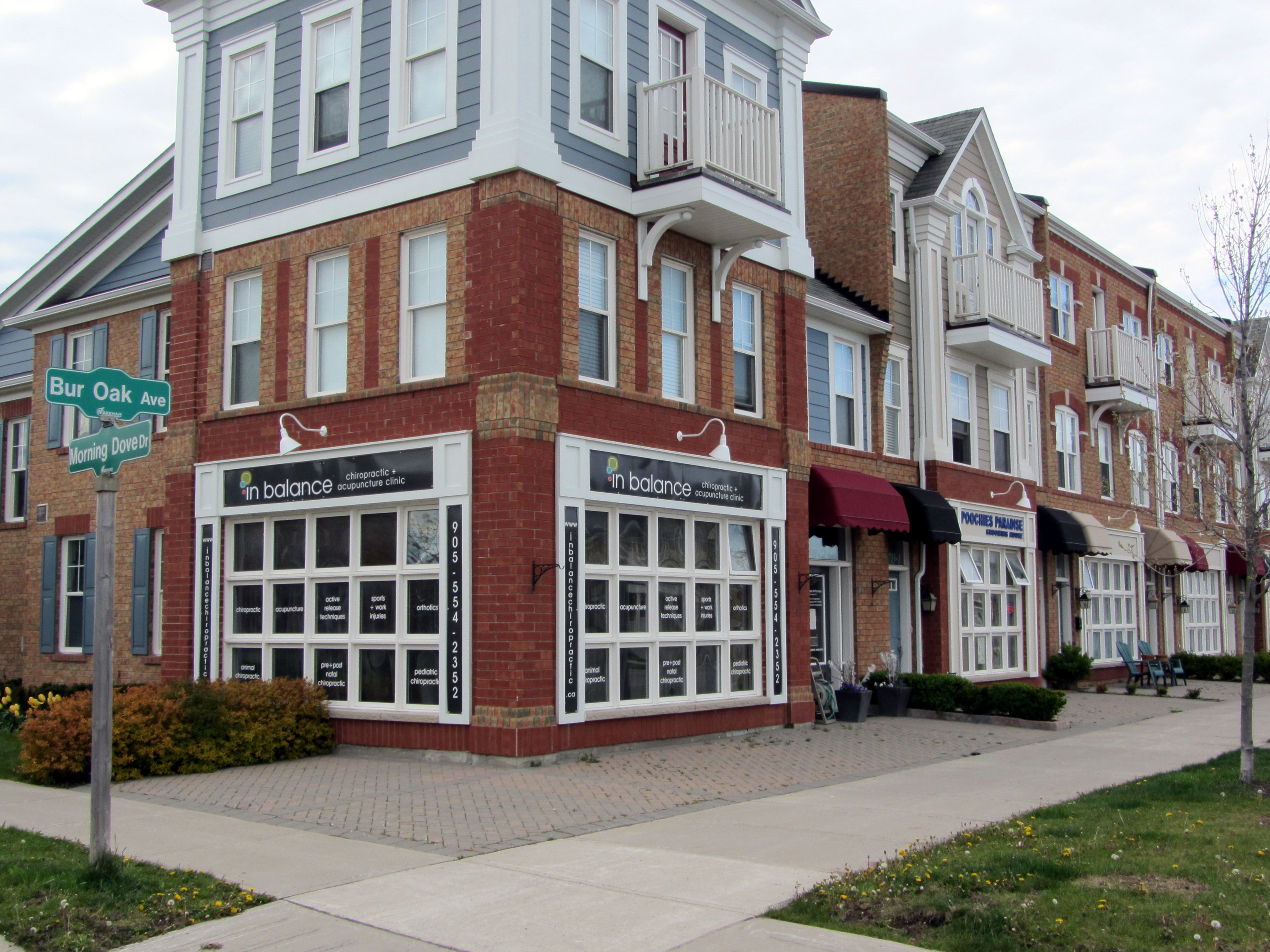 Fine-grained mixed-use at corner of Bur Oak Ave and Morning Dove Drive