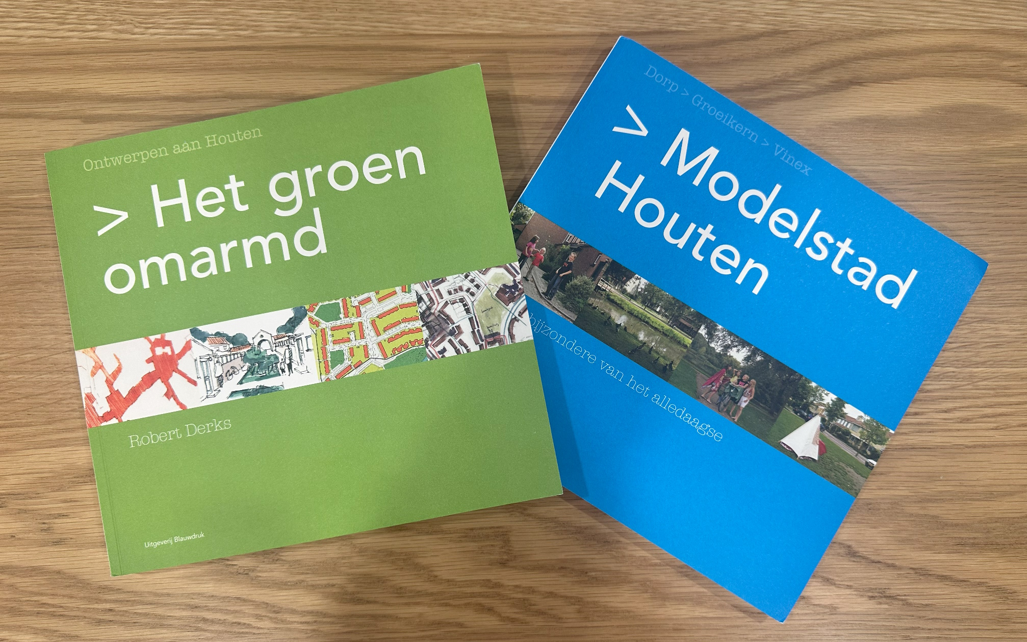 Het groen omarmd and Modelstad Houten books